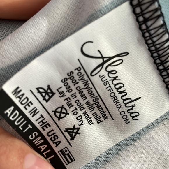 A Patterned Black, Red, and White T-Shirt - Picture 3 of 3